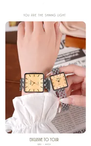 Vue détaillée des montres carrées Gedi pour couple avec bracelets en acier argenté