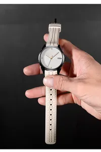 Detail of GEDI sports watch with silicone strap and textured concentric circle dial