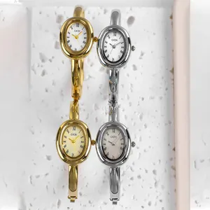 Reloj de pulsera de cuarzo ovalado retro para mujer con números romanos y banda de metal