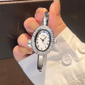 GEDI Mode Oval Armreif-Uhr Für Damen Luxus Strass Legierung Quarz Armbanduhr Mit Römischen Ziffern Elegante Schmuck Uhr