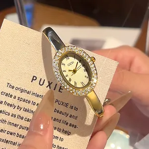 GEDI Montre Bracelet Ovale de Luxe Pour Femme Incrustation de Strass Montre à Quartz Vintage Chiffres Romains Bracelet en Alliage Bijoux de Mode