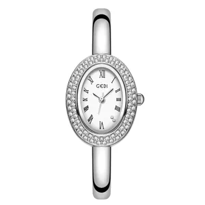 Luxuriöse silberne Quarzuhr für Damen mit ovalem Gehäuse, Diamantbesatz und Armreif
