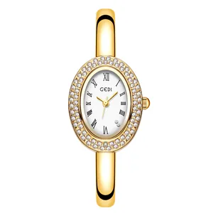 Montre jonc dorée élégante pour femme avec lunette en cristal et chiffres romains