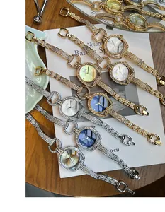 Detail of GEDI luxury women's watches with rhinestone bracelets in gold and silver