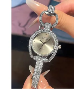 Close-up of GEDI luxury women's watch with sparkling crystals and silver bracelet strap