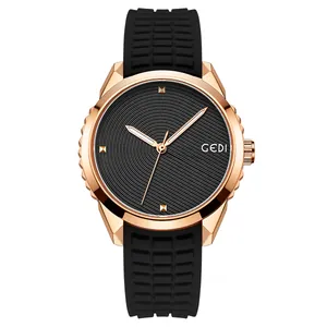 GEDI quartz watch with rose gold case, black sunray dial, and black silicone strap