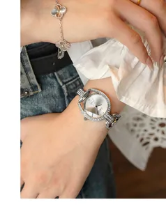 Close-up of GEDI silver quartz watch with diamond bezel and openwork bracelet link