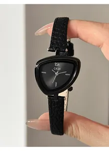 Macro view of unique triangular watch face with black leather strap for women