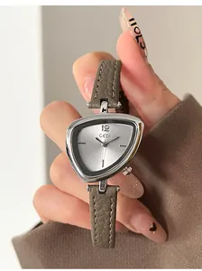 Detailed view of the GEDI triangular watch with silver dial and grey leather strap