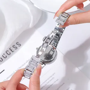 Elegant ladies silver watch with full diamond strap and stainless steel back detail