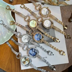 GEDI luxury women's watch set featuring rhinestone-encrusted bracelets and quartz movements