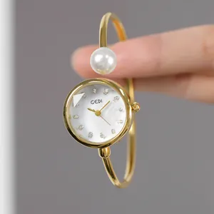 Orologio a bracciale GEDI dorato da donna con quadrante in madreperla e perla fine