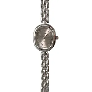 Elegant vintage oval silver watch for women with Roman numerals and metal link bracelet