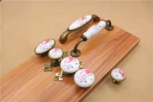 Ceramic and bronze furniture handles with floral patterns for cabinets and drawers