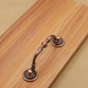 Vintage bronze drop pull handle with ornate engraving for cabinets and drawers
