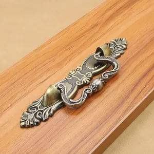Antique bronze drawer handle with embossed floral patterns for vintage European cabinets