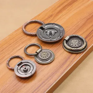 Macro detail of antique bronze zinc alloy flower carved cabinet ring pulls for furniture