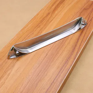 Modern brushed silver alloy drawer handle showing mounting holes on wood surface