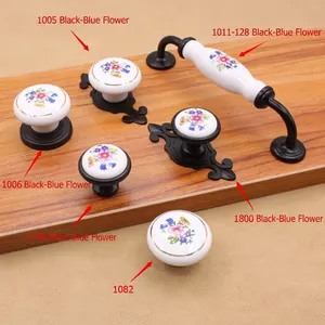 Floral ceramic cabinet handles and knobs with black bases in vintage pastoral style