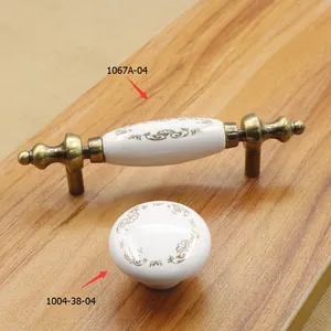 European vintage ceramic cabinet handles with gold floral patterns and bronze finish