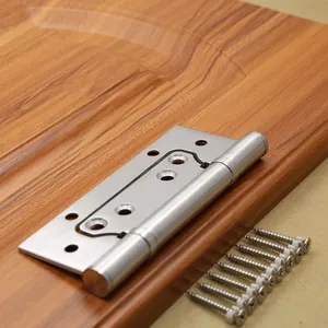 Detail view of 4-inch stainless steel door hinge on dark wood grain surface with screws