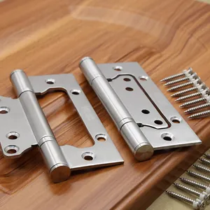 Macro shot of silver SUS-304 stainless steel hinges with screws on dark wood