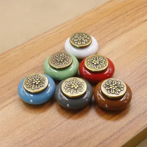 Retro ceramic drawer knobs with floral metal caps in six assorted colors on wood
