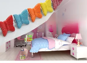 Detail of colorful butterfly ceramic knobs for children's drawers and cabinets