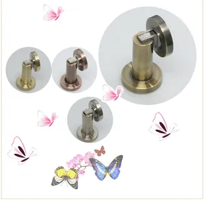 Magnetic cylindrical door stopper set in bronze, nickel, and gold finishes for wall mounting