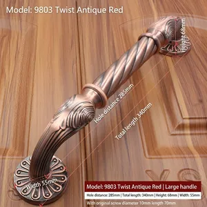 Detail view of antique bronze door handle with 285mm hole spacing and spiral design