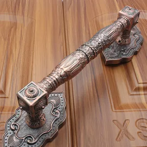 Detailed relief carving on antique bronze door handle for European style wooden villa doors