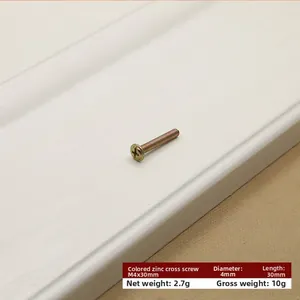 Macro view of M4x30mm Phillips head screw in yellow zinc finish for furniture