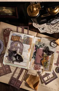 Detail of vintage hollow lace paper featuring cat and floral motifs for DIY journals