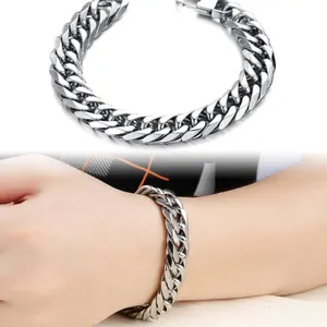 Detailed macro view and wrist display of silver Cuban link stainless steel bracelet for men