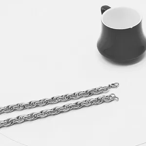 Polished stainless steel Cuban chain link with secure lobster clasp and minimalist finish