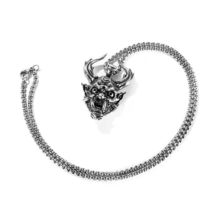 Vintage stainless steel Hannya mask skull pendant on a heavy box chain necklace
