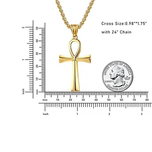 Detailed scale view of a gold Ankh cross pendant with measurements and size reference
