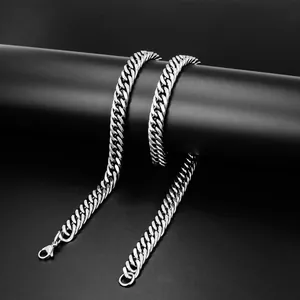 Detail of silver stainless steel Cuban link chain with lobster clasp on black stand