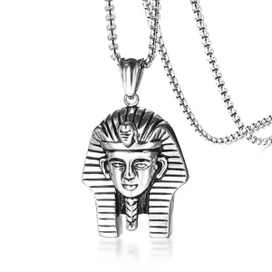 Detailed macro view of an ancient Egyptian pharaoh pendant in aged stainless steel