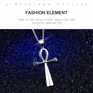 Polished silver Ankh cross pendant with fine chain on deep blue glitter background