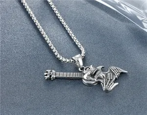 Macro detail of gothic guitar skeleton pendant in vintage finished stainless steel