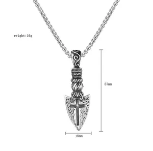 Detailed view of vintage silver arrow pendant with cross engraving and size dimensions