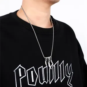 Gothic punk necklace with silver triple skull pendants on a high-quality titanium steel chain