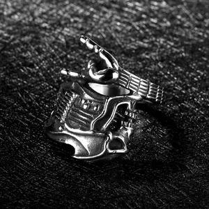 Vintage punk guitar finger ring for men featuring silver black rock gesture design