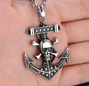 Close-up of punk style pirate anchor pendant necklace with skull design for men