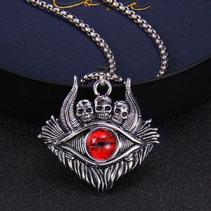 Gothic evil eye necklace in vintage silver steel with a red eyeball and skull pendant