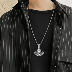 Detail of Viking Valknut axe pendant on a men's stainless steel necklace chain
