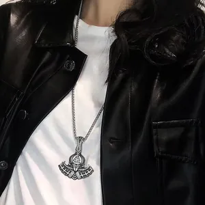 Close-up of Viking Odin axe pendant with Valknut symbol on stainless steel chain