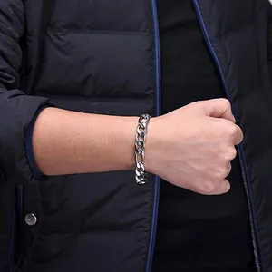 Classic men's silver steel Figaro chain link bracelet shown on male wrist