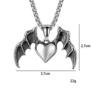 Gothic heart pendant with bat wings on a silver box chain, 3.7cm wide and 2.7cm high